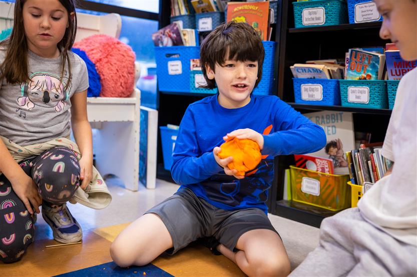 Students make planets out of Play-Doh